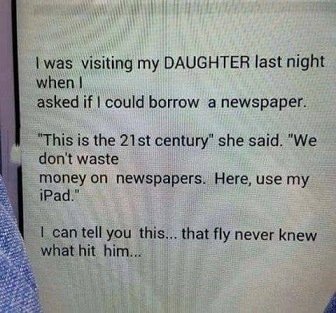 iPad instead of newspaper.jpg