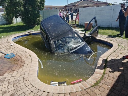 Car in pool.jpeg